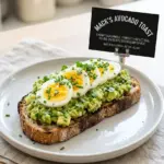 Simple and zesty Mediterranean avocado egg salad in a bowl with fresh ingredients.